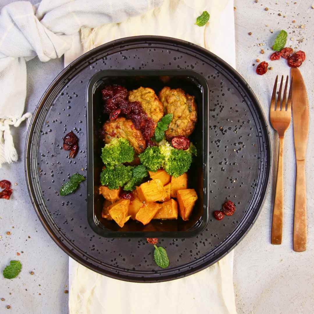 Lean and clean turkey rissoles with sweet pumpkin, broccoli and a drizzle of cranberry sauce.