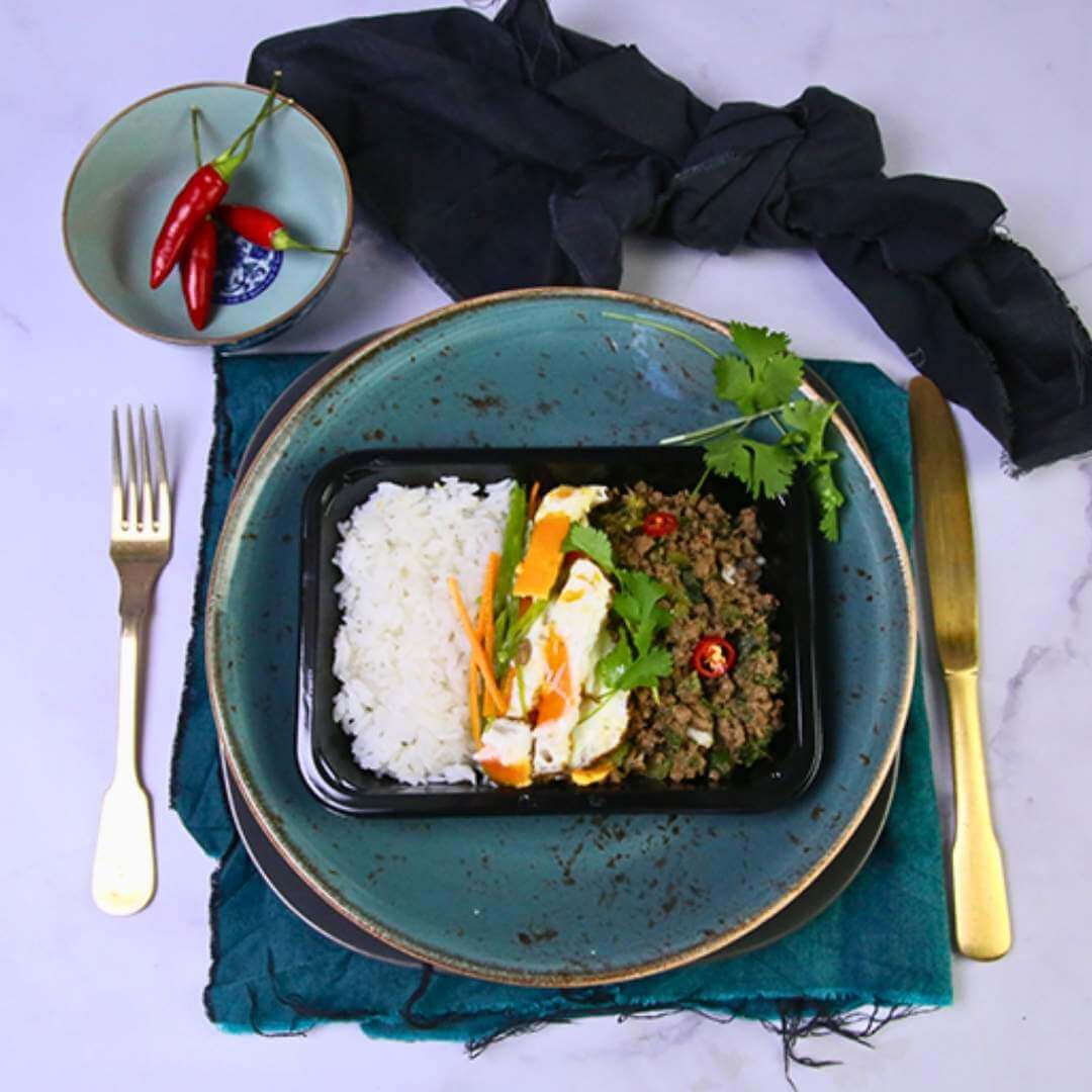 Thai Beef Mince bursting with classic Thai flavours and layered on a bed of soft jasmine rice with a fried egg.